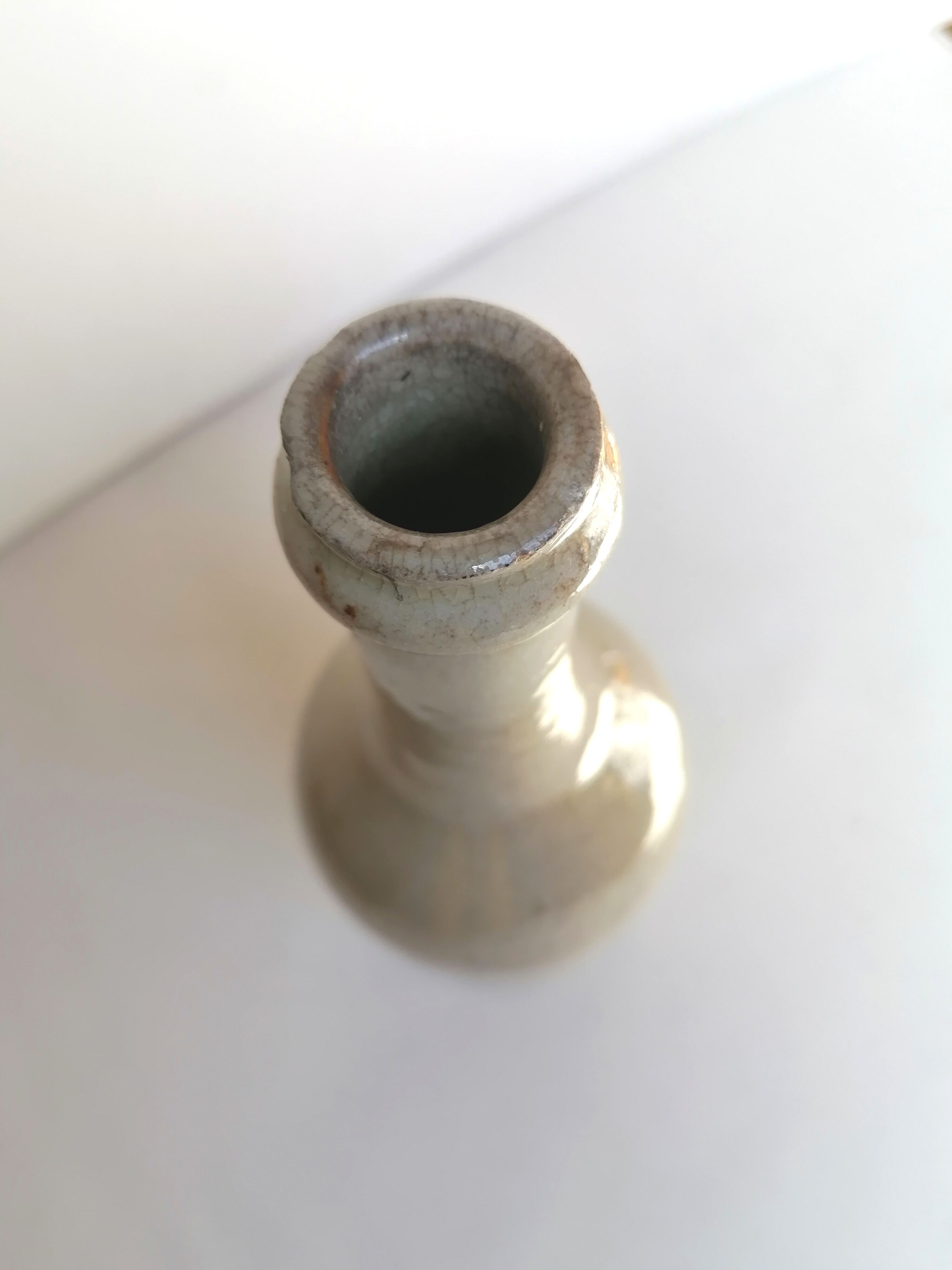 Cracked enamelled sandstone bottle