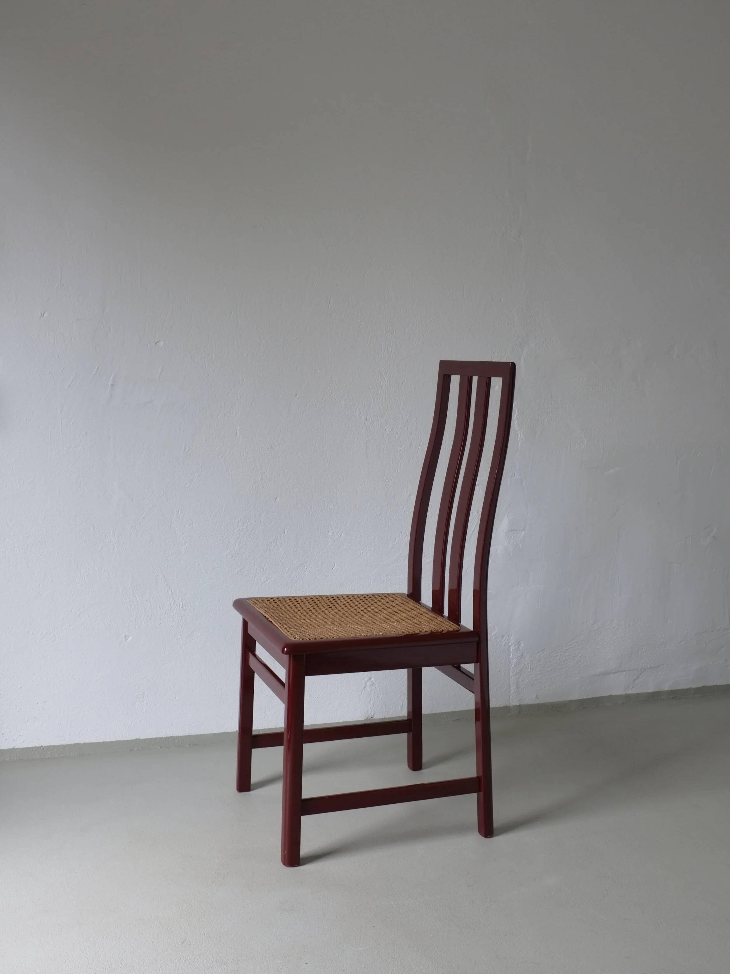 4 Glossy wine red cane seat chairs | Italy | 1970s