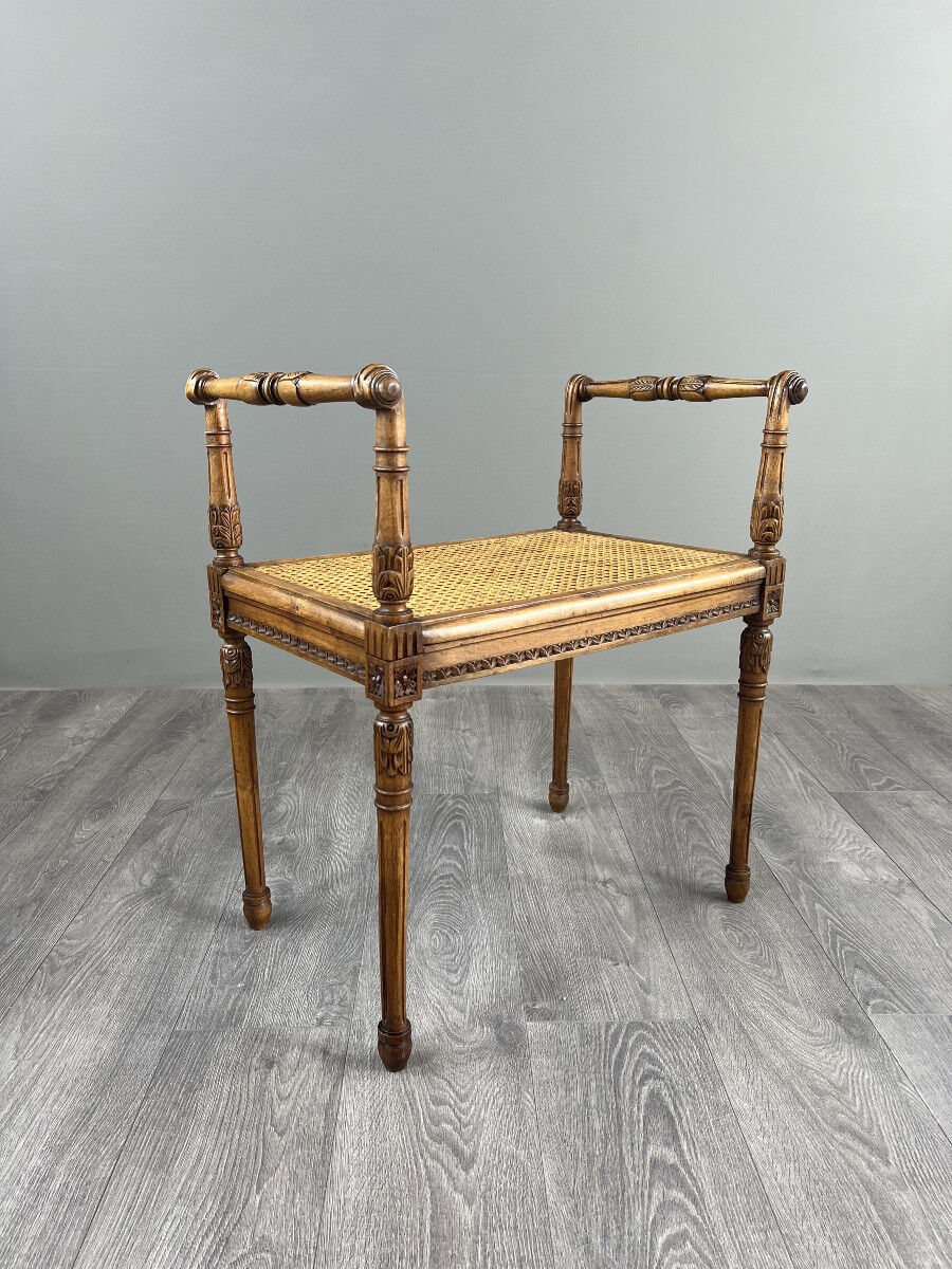 Banquette / tabouret en bois sculpté et cannage, XXe siècle