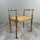 Banquette / tabouret en bois sculpté et cannage, XXe siècle