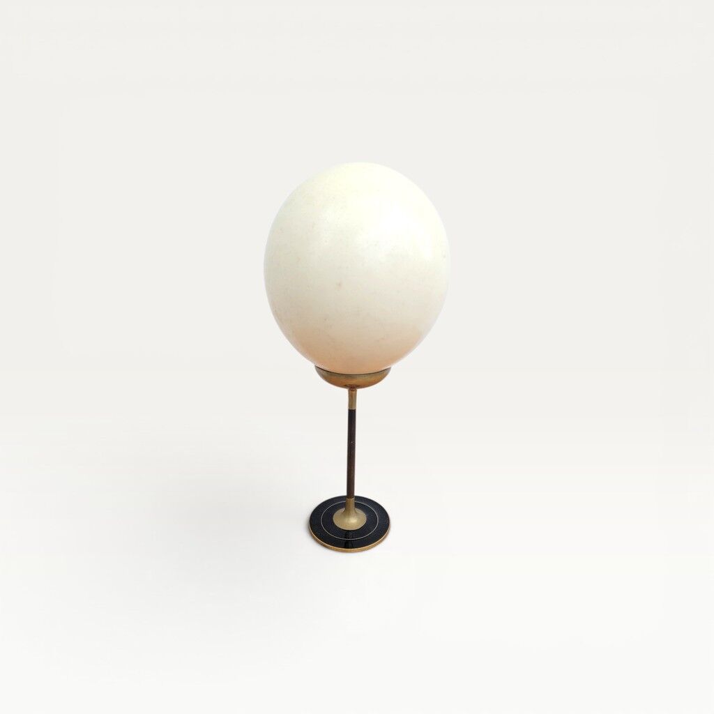 Ostrich egg on a brass stand