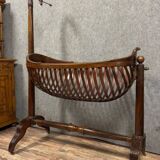 Empire Mahogany Swan Neck Cradle in the Shape of a Basket Circa 1810