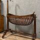 Empire style mahogany cradle with a swan neck, shaped like a cradle, circa 1810