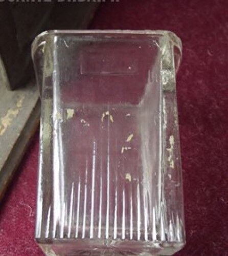 Old wall-mounted coffee grinder