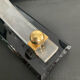 Pair of Hollywood Regency candlesticks in lucite and brass