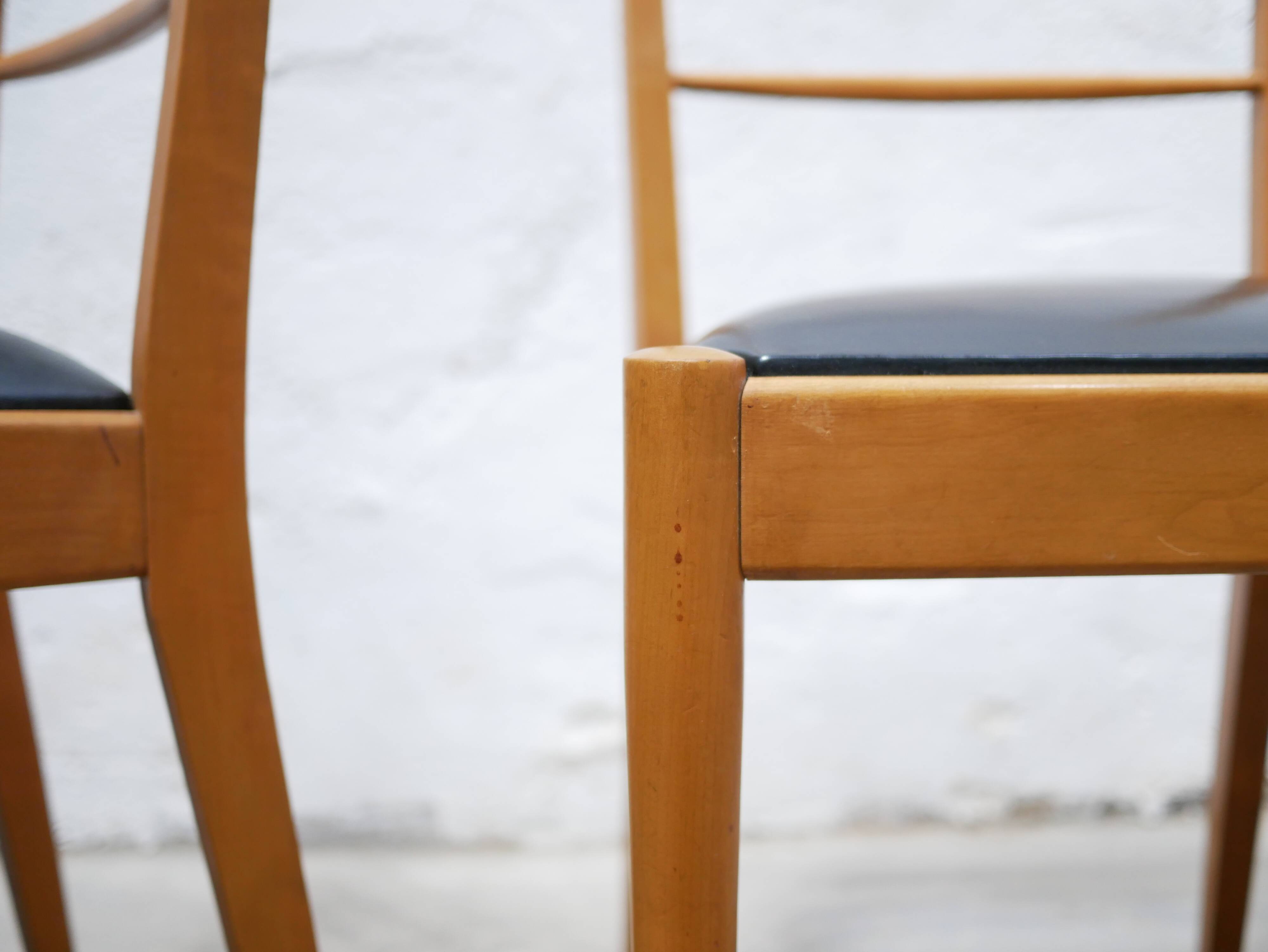 Series of 4 vintage chairs in wood and skaï