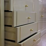 Showcases in lacquered wood, glass and brass  1970s, set of 4