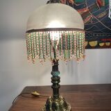 Bronze, opaline and tassel table lamp