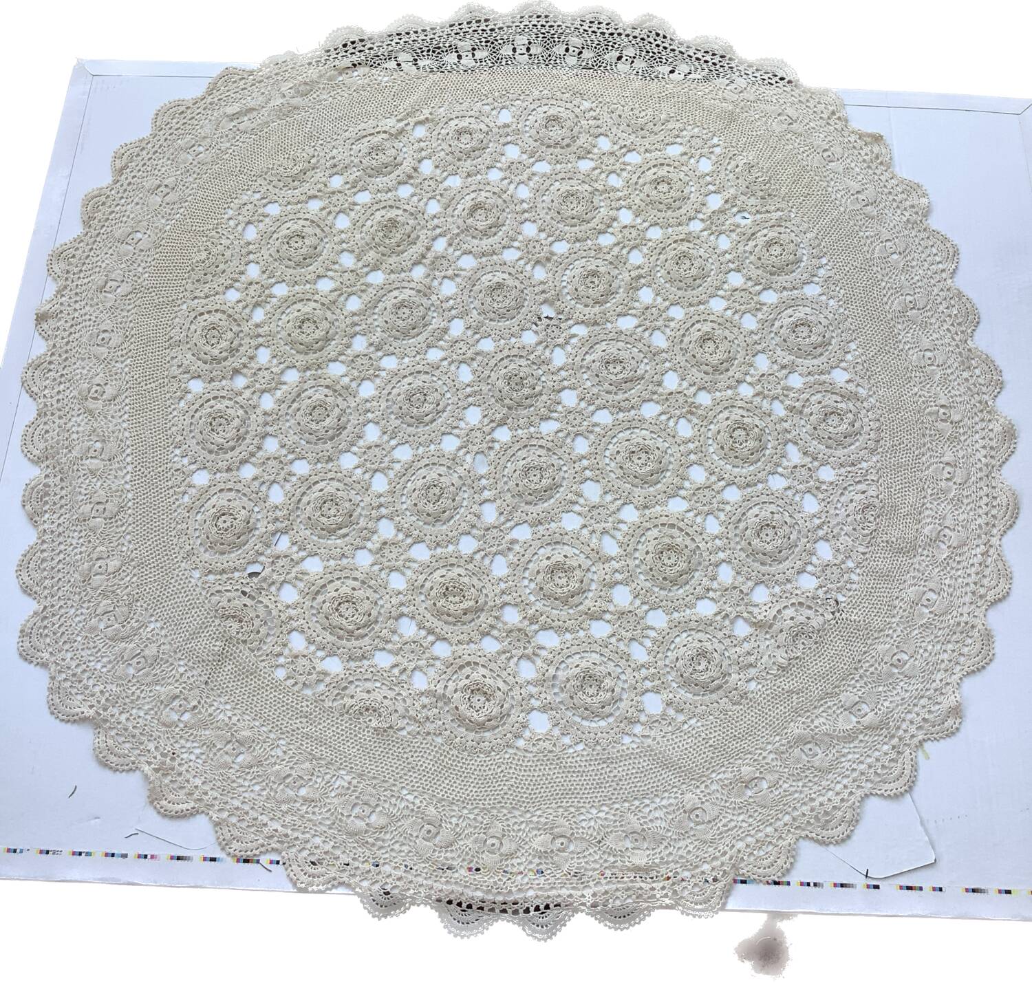 Round crocheted tablecloth