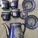Vintage blue Taous dinnerware set of 21 pieces in very good overall condition.