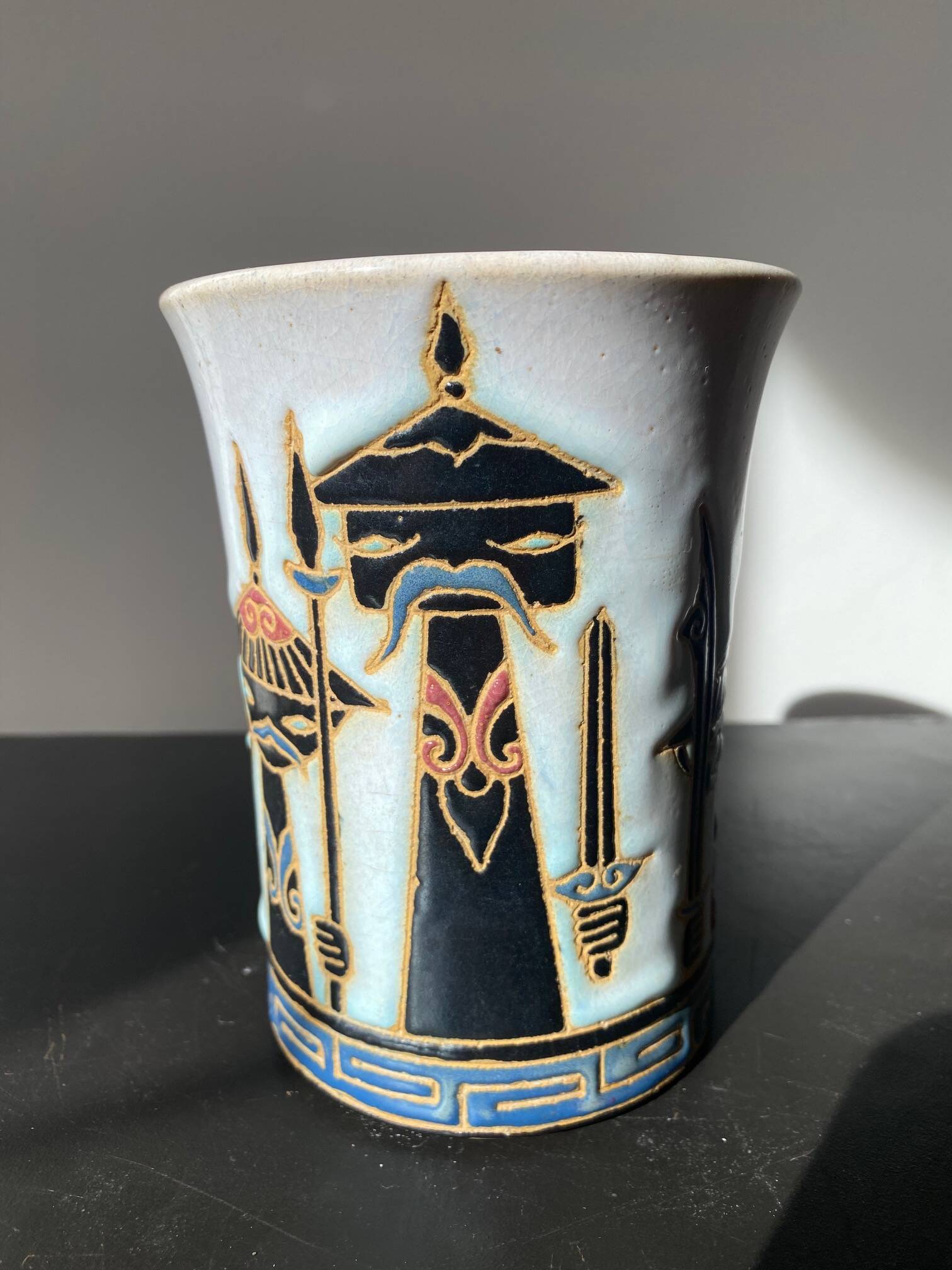 Ceramic vase with soldiers