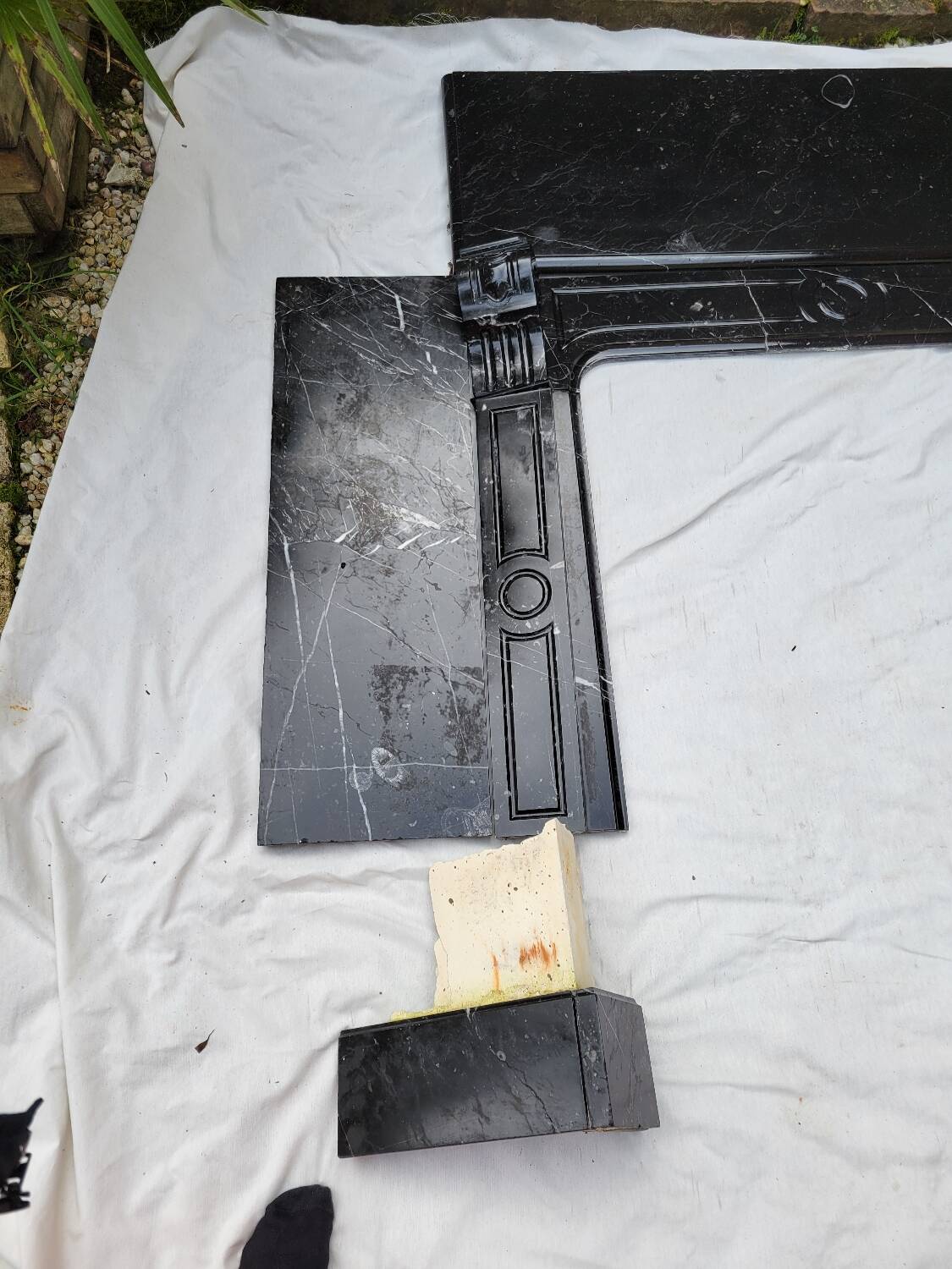 Pompadour fireplace with black marble modillions