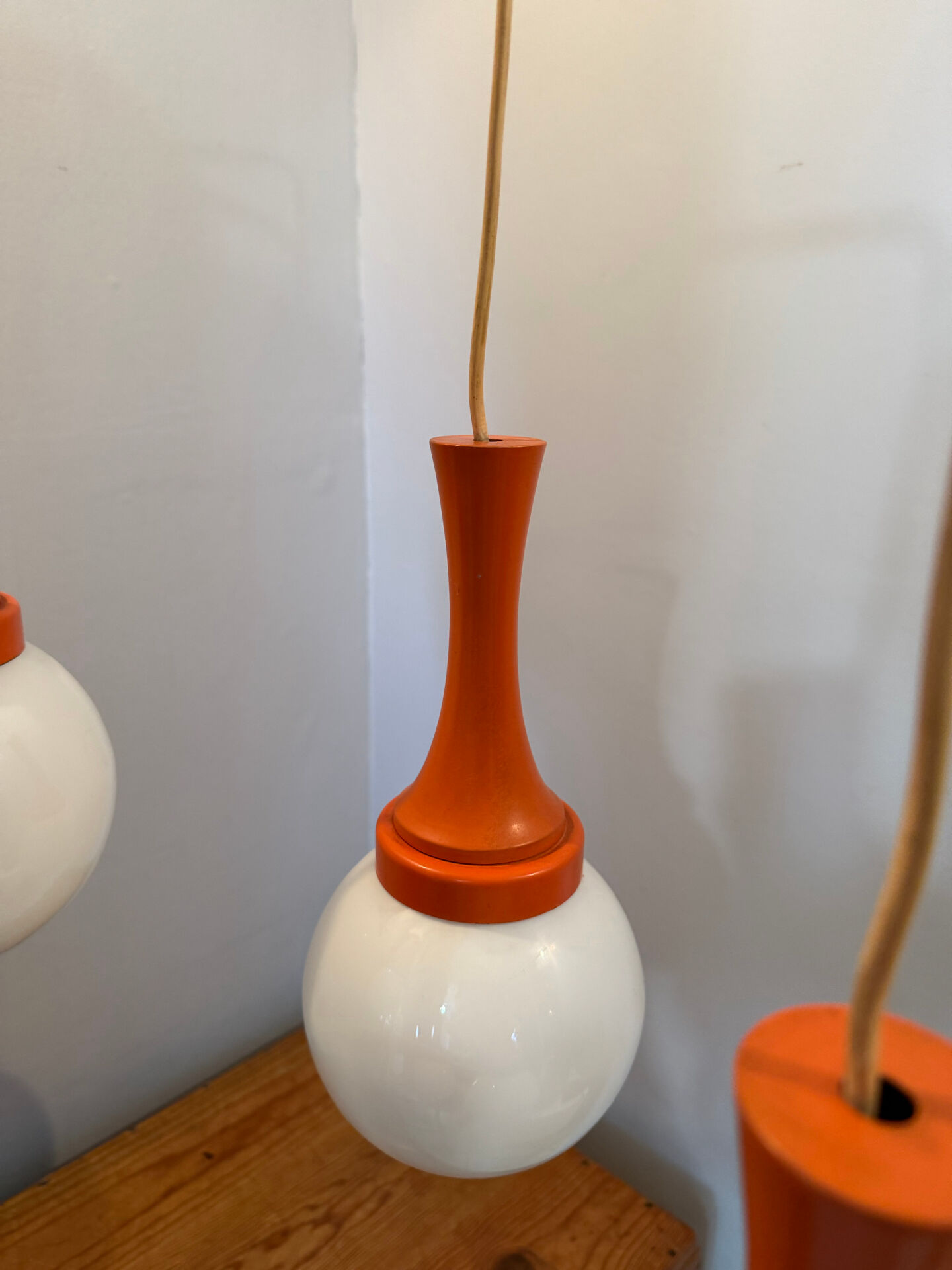 Suspension cascade design Space age orange vintage from the 70s.