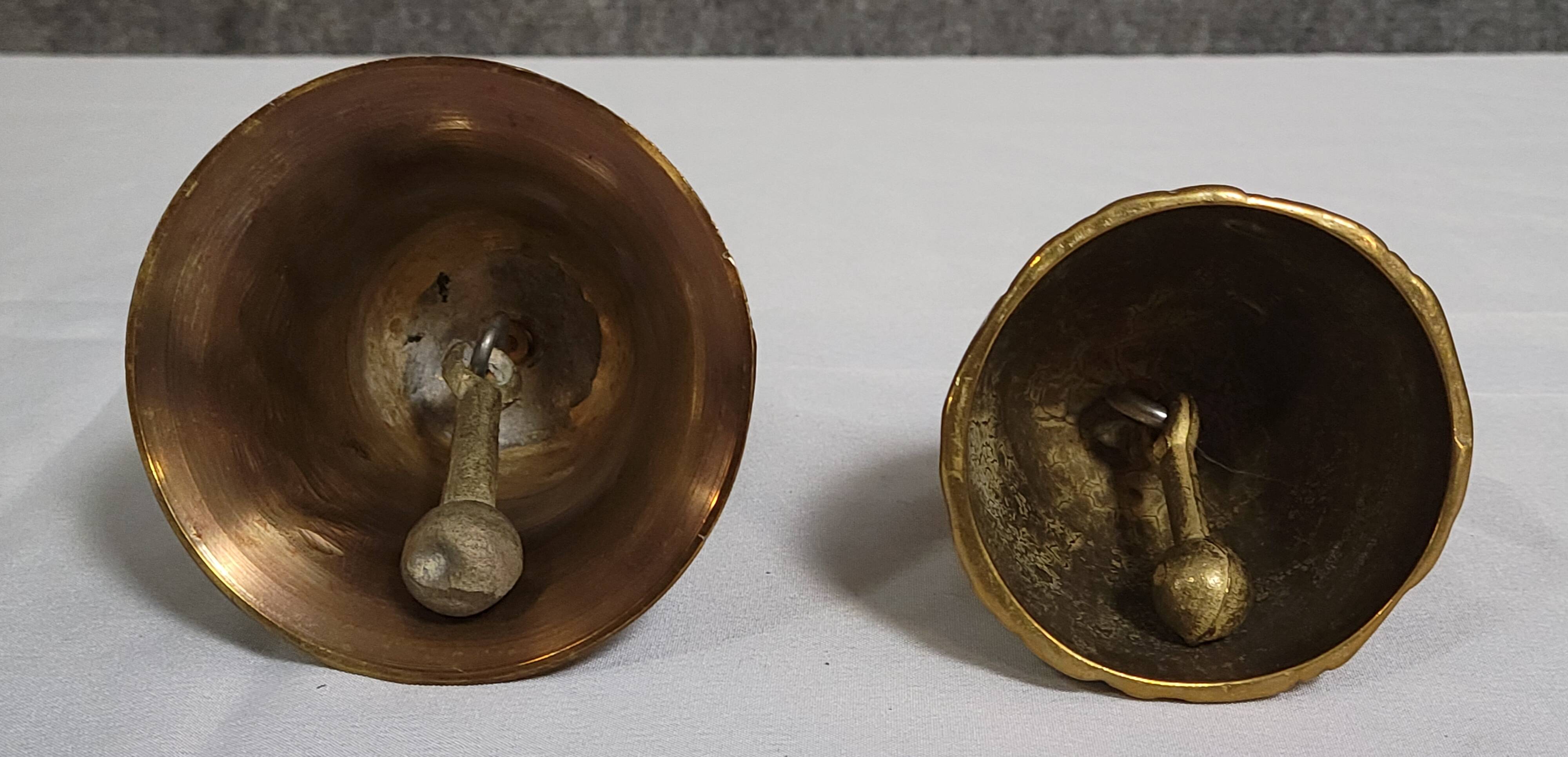 Two vintage bronze table cloches, finely chiseled and gilded