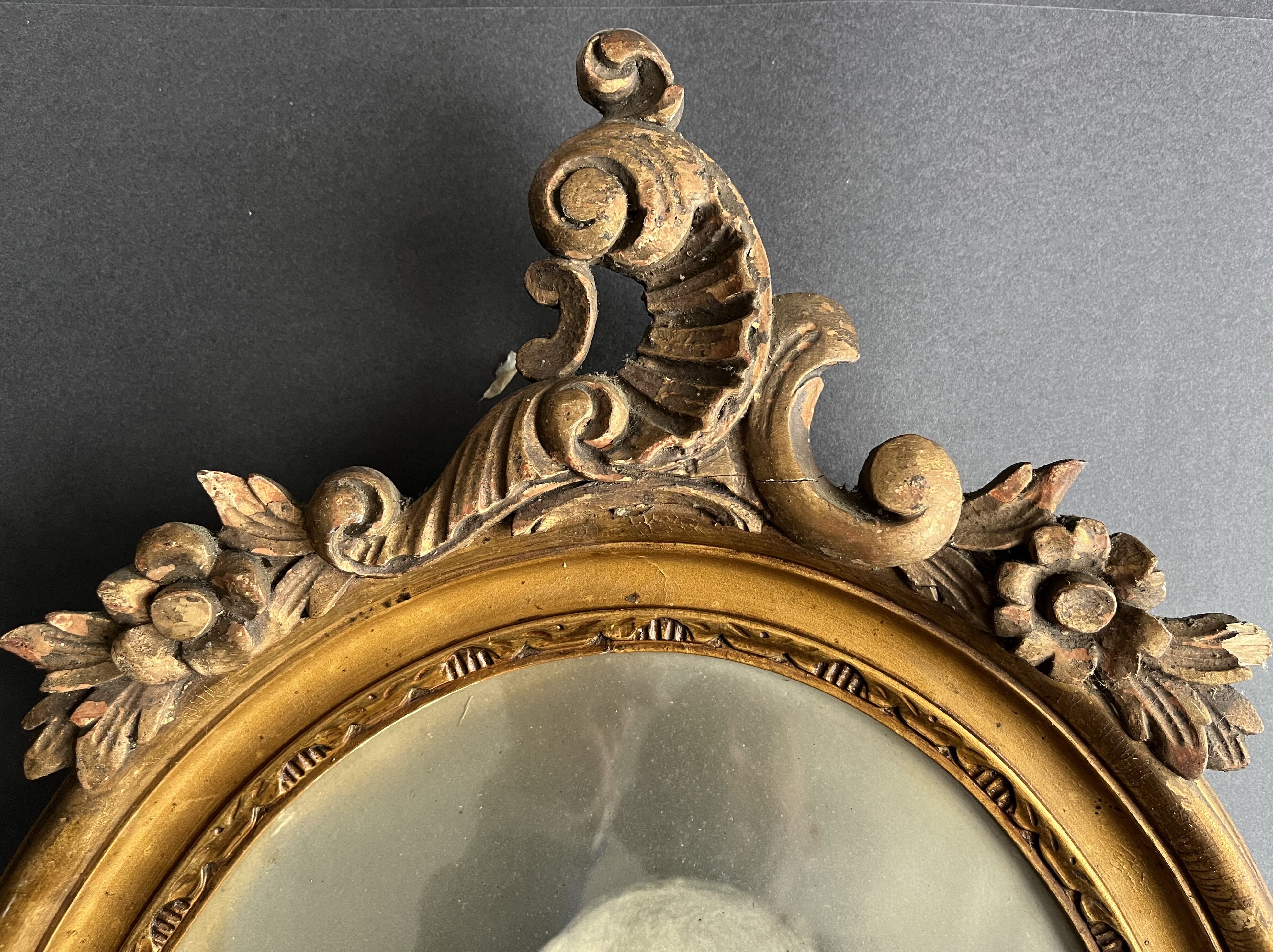 Carved and gilded wooden frame