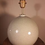 Ceramic lamp with rattan lampshade.