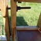 Old solid wood carpenter's bench with 2 functional vices.