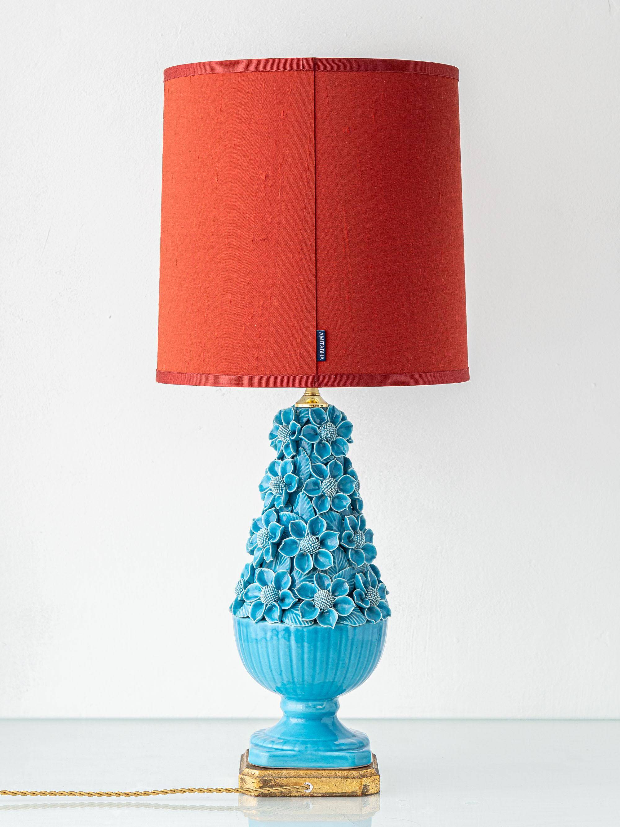 Turquoise glazed ceramic floral table lamp from Manises mid-century, with a new silk shade.