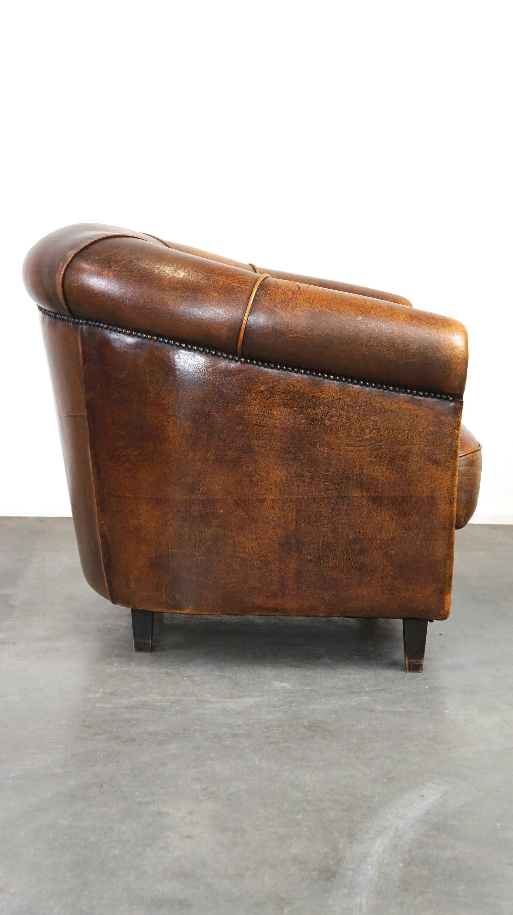 Charming, classy, and comfortable sheepskin leather club armchair