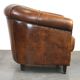 Charming, classy, and comfortable sheepskin leather club armchair