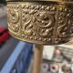 Floor ashtray in gilded brass (frieze of fish)