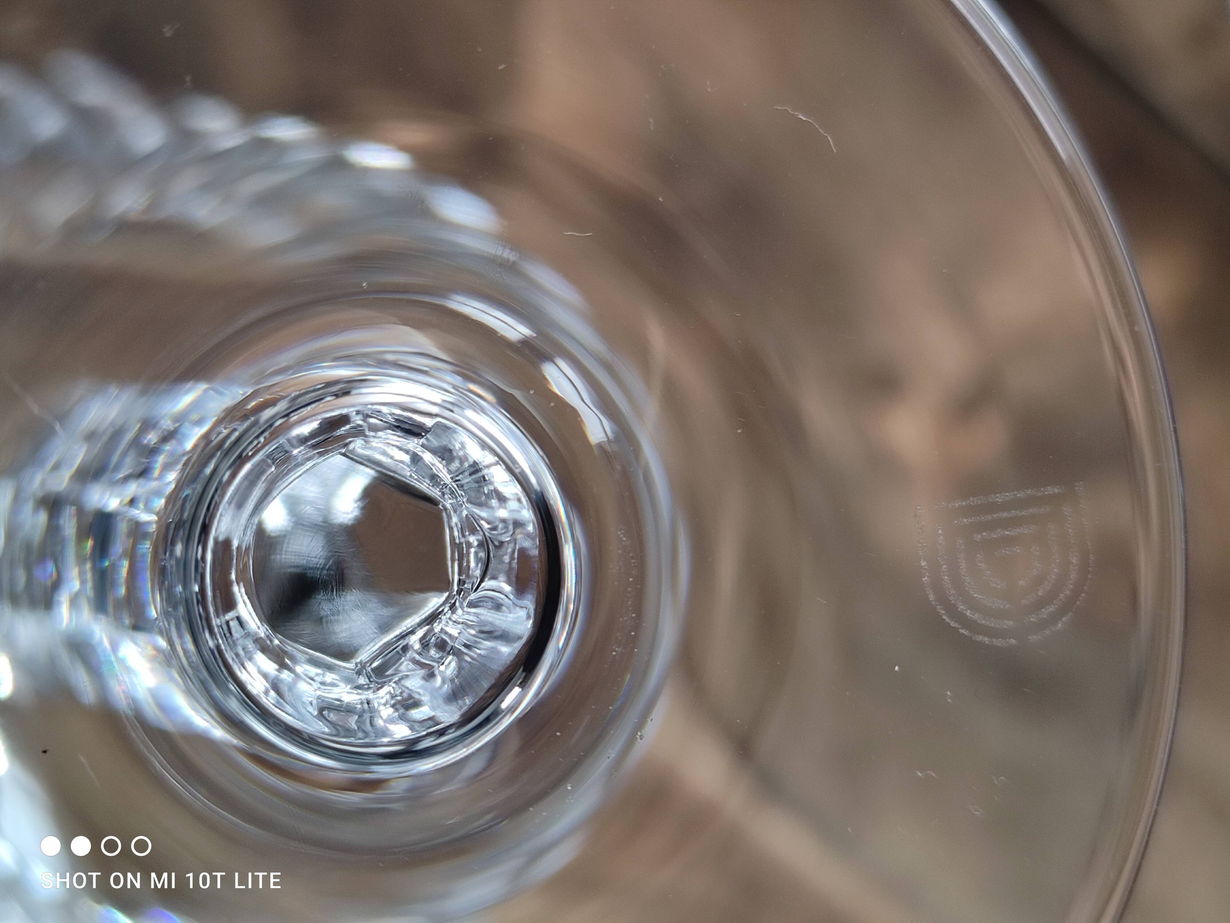 Set of 7 cut crystal wine glasses