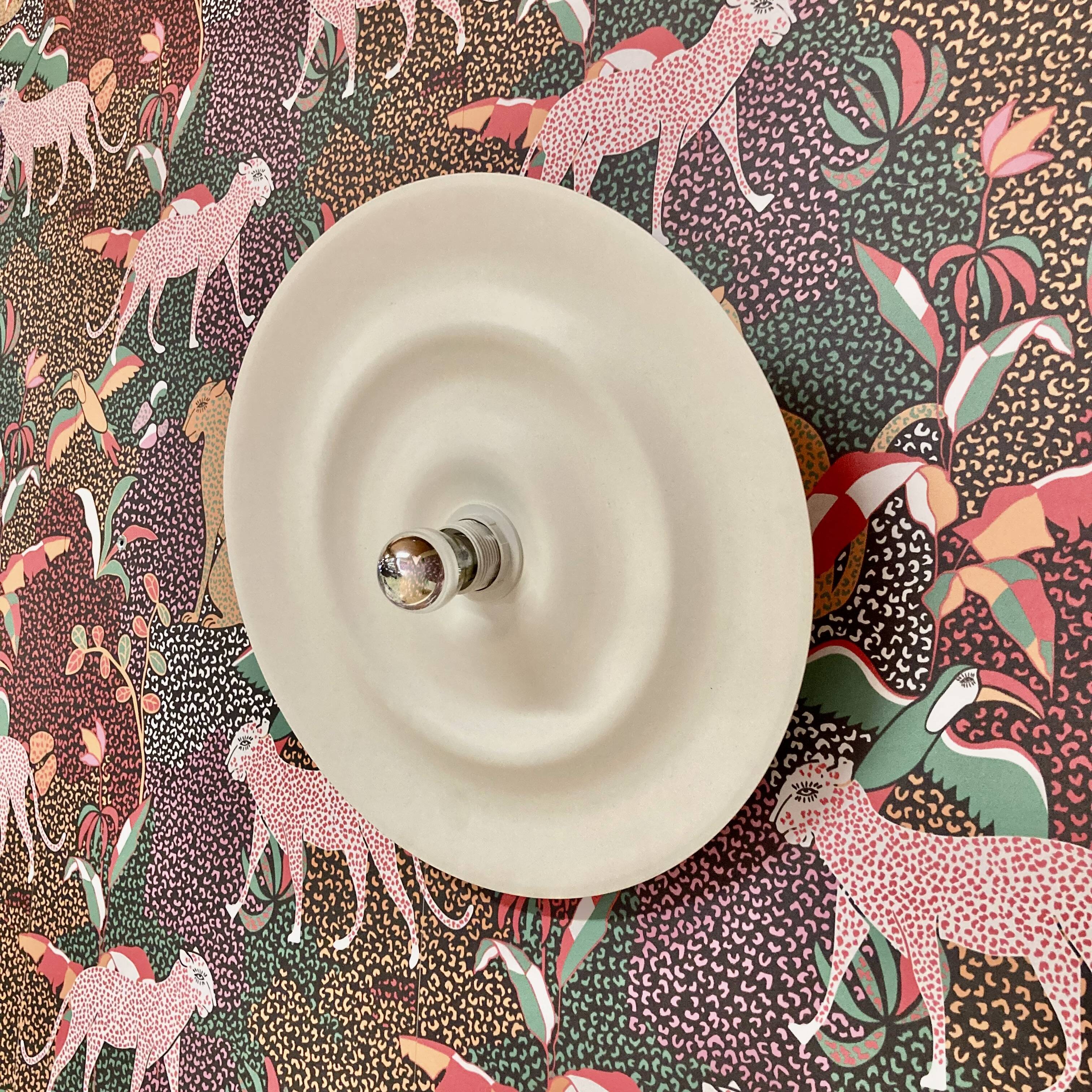 Large Scandinavian design metal wall light.