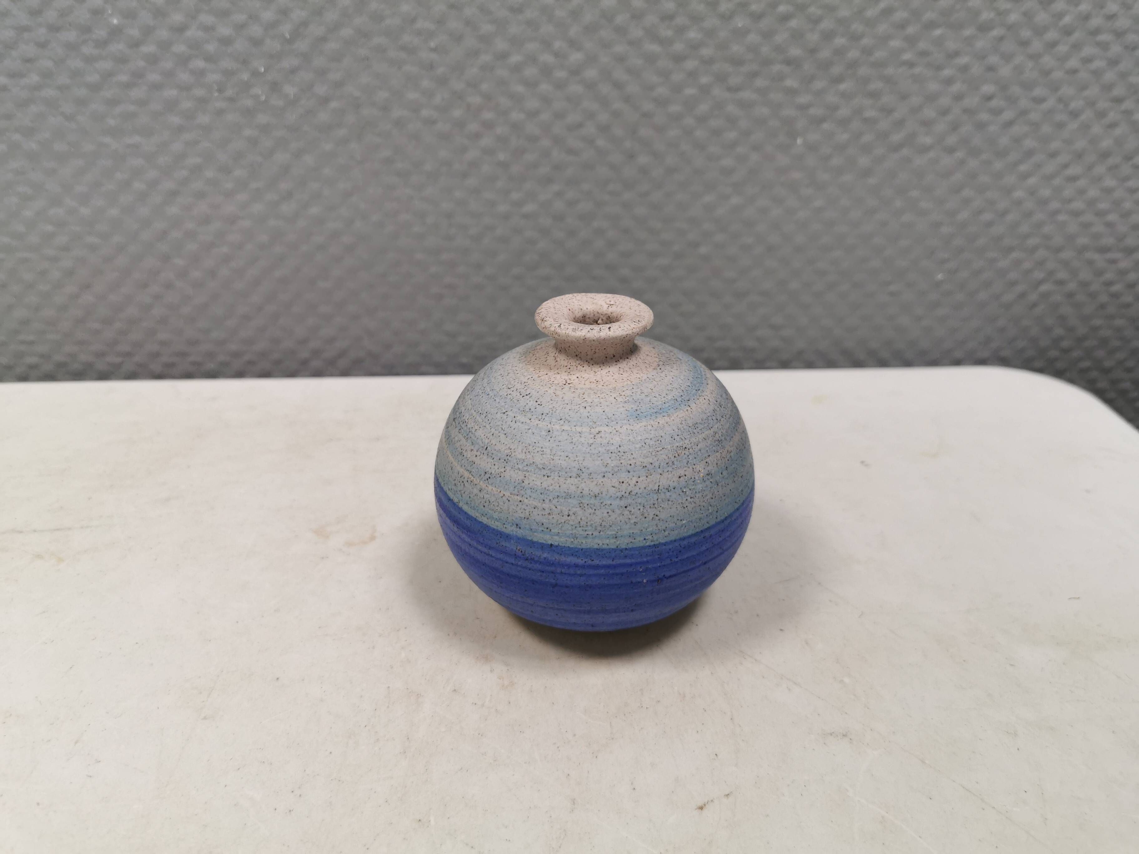 A small, round, beautiful ceramic vase from Denmark, dating from the 1980s.