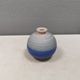 A small, round, beautiful ceramic vase from Denmark, dating from the 1980s.