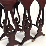 Series of three red lacquered nesting tables with gold decoration in Asian style, nineteenth