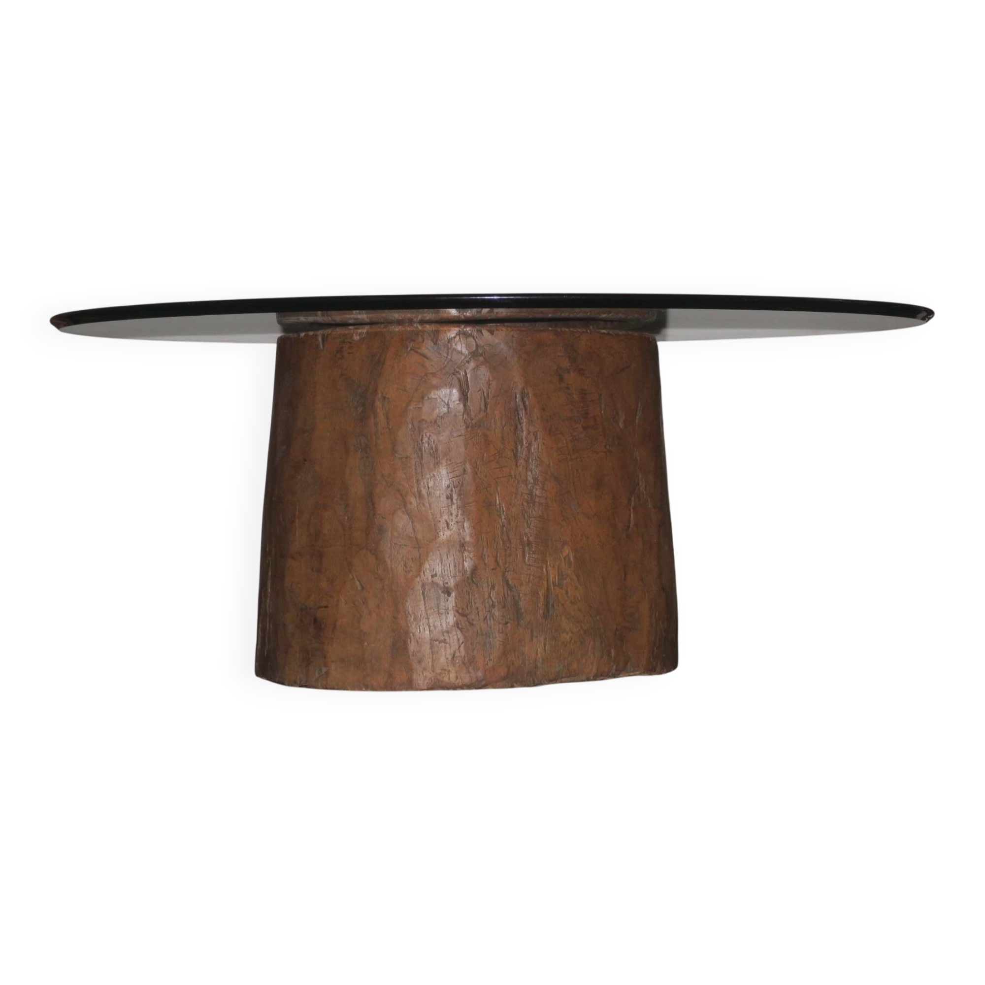 Antique hand carved mortar coffee table with circular glass top