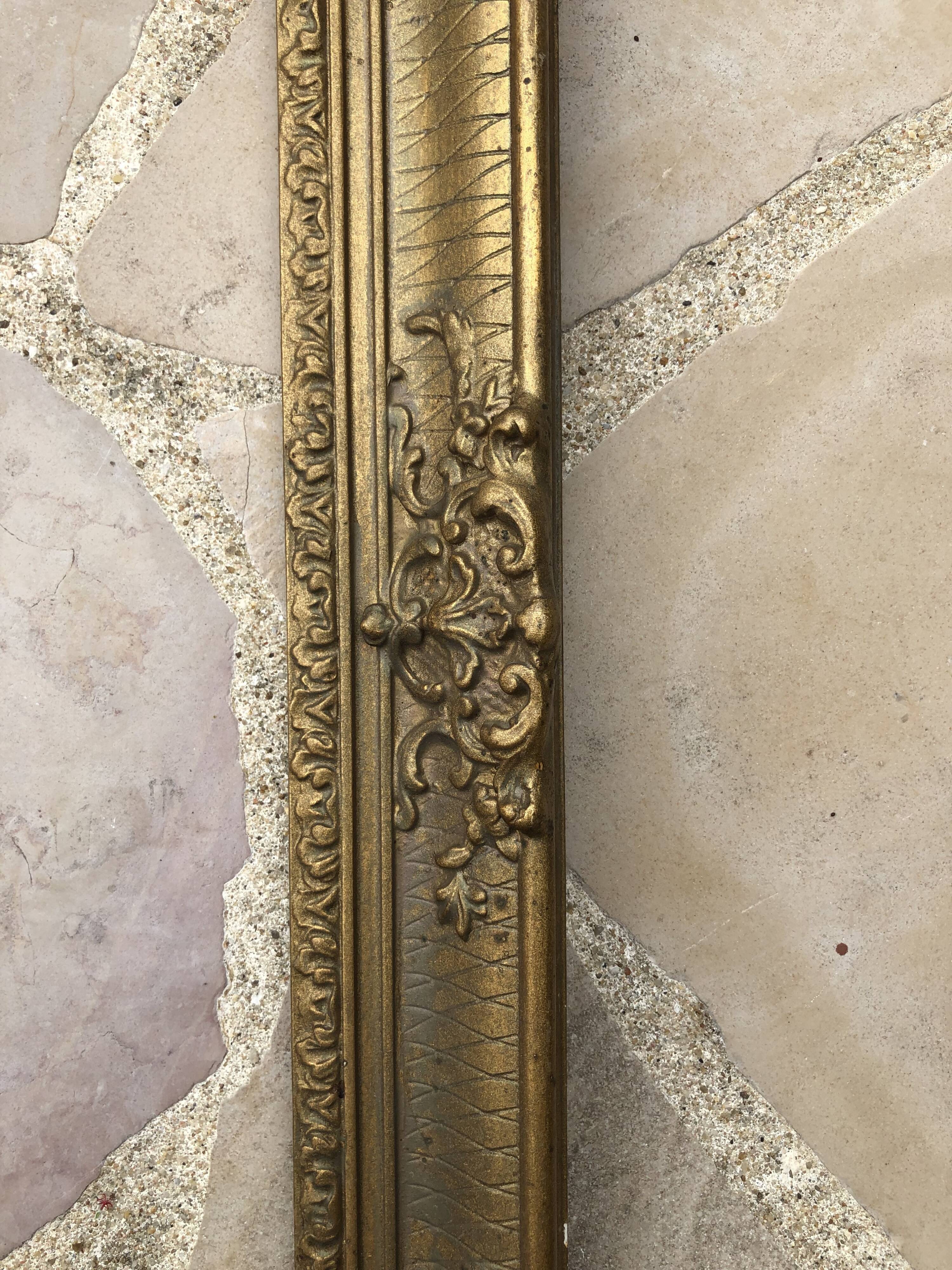 Old frame in gilded molded wood