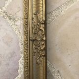 Old frame in gilded molded wood