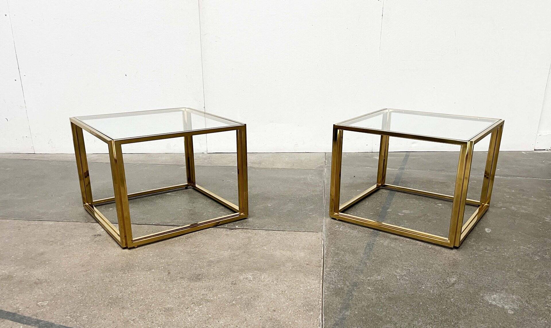 Cube side tables in brass and glass in the French Hollywood Regency style by Maison Charles, 1970s, set of 2.