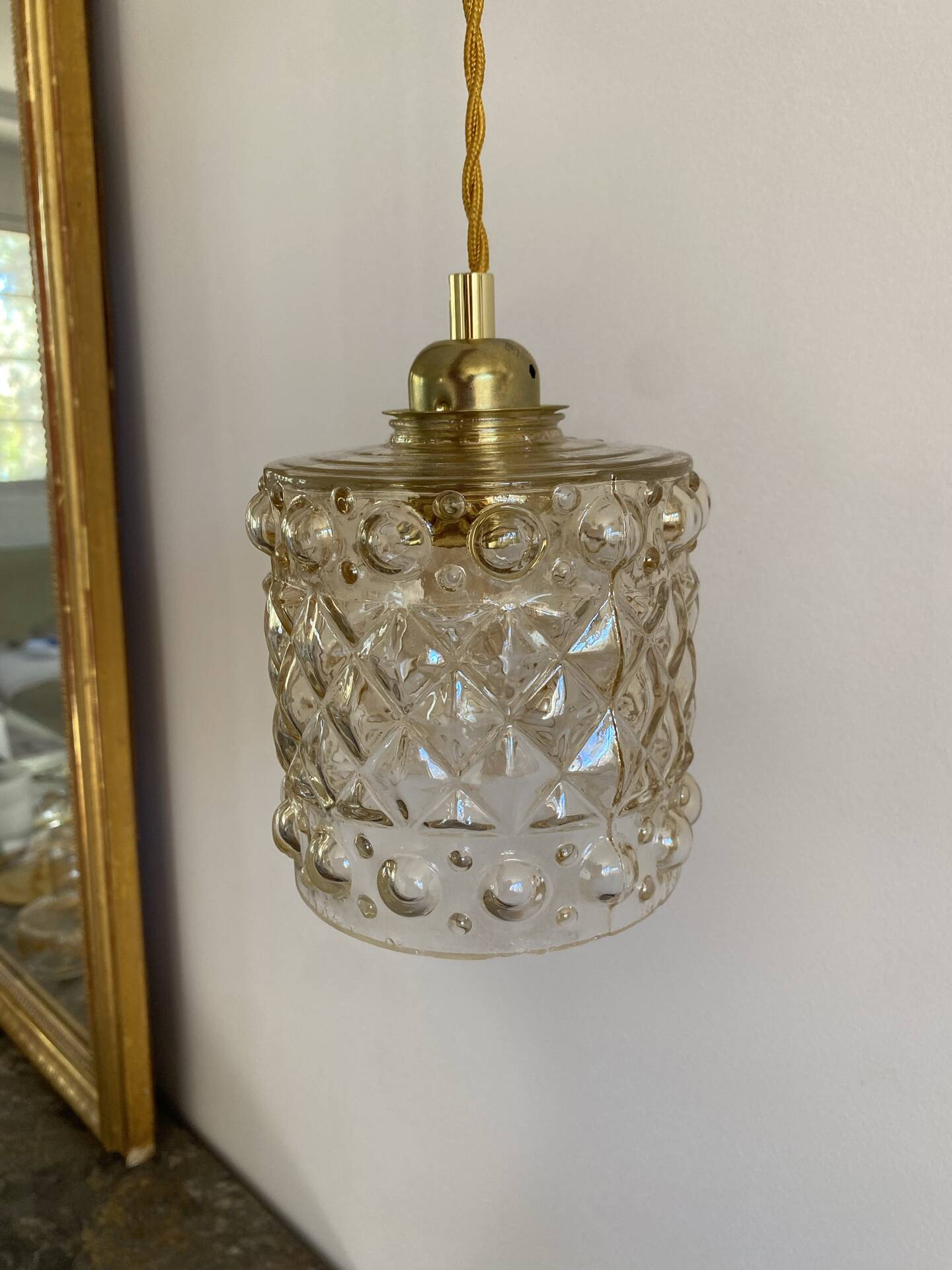 Vintage amber glass suspension globe