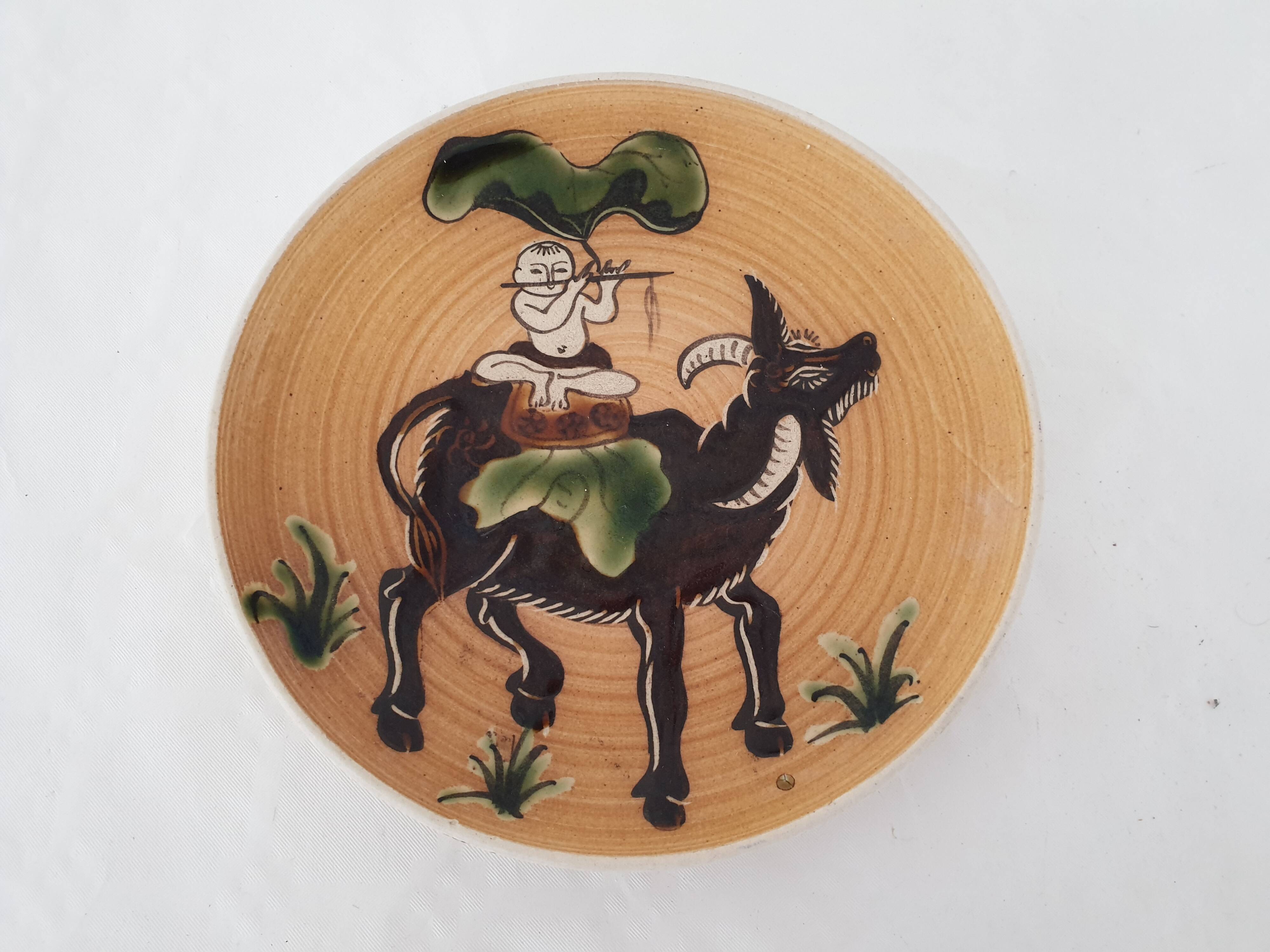 Ceramic plate sacred cow Buddha Vietnam