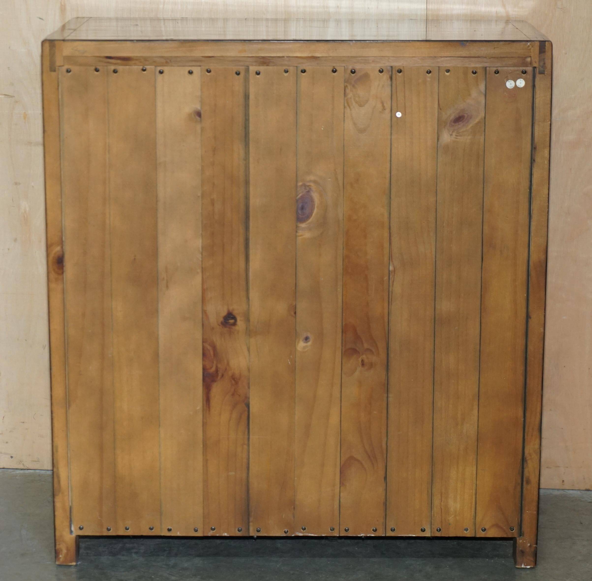 Large vintage hardwood furniture in military country style.