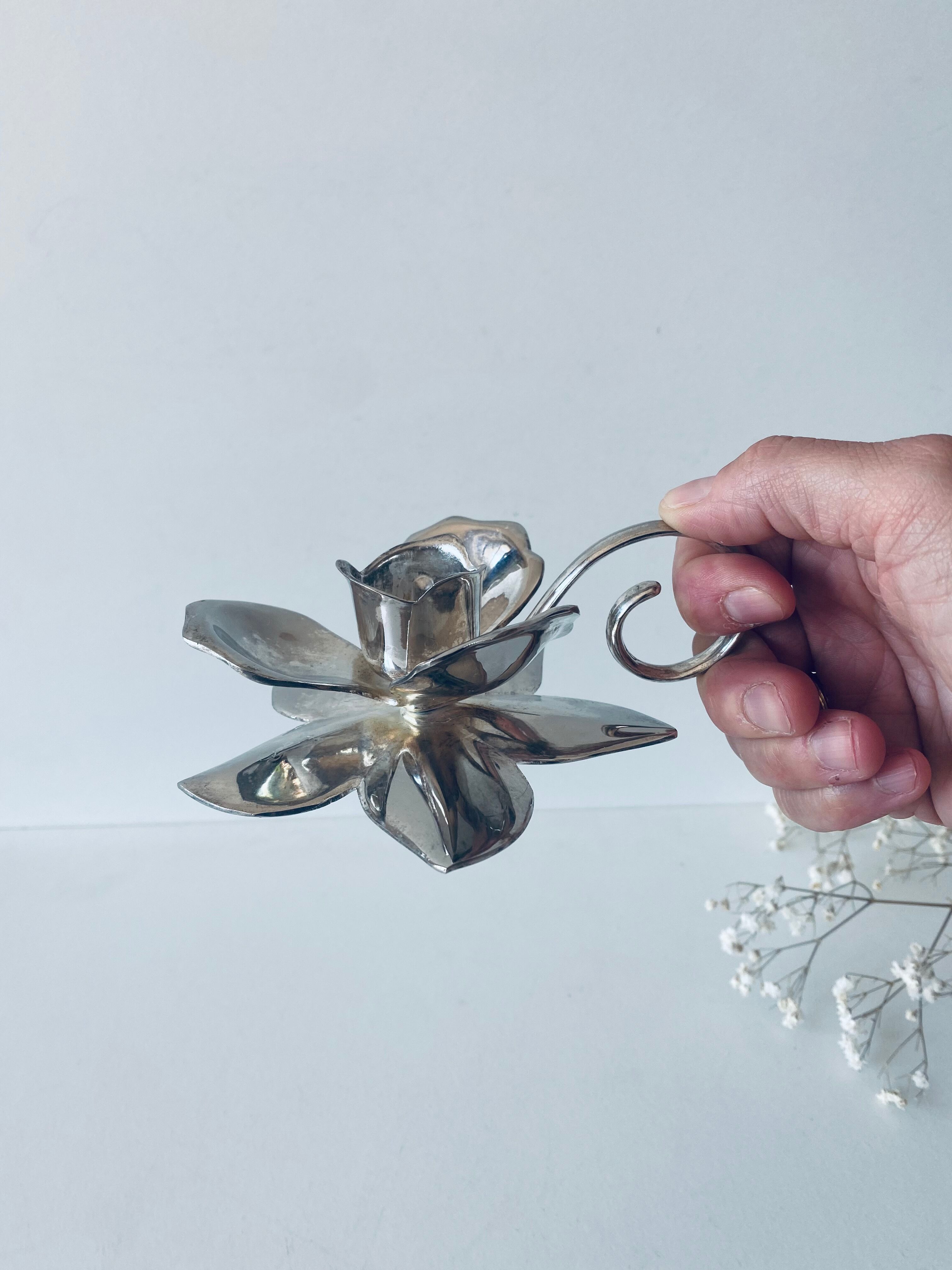 Silver flower candle holder