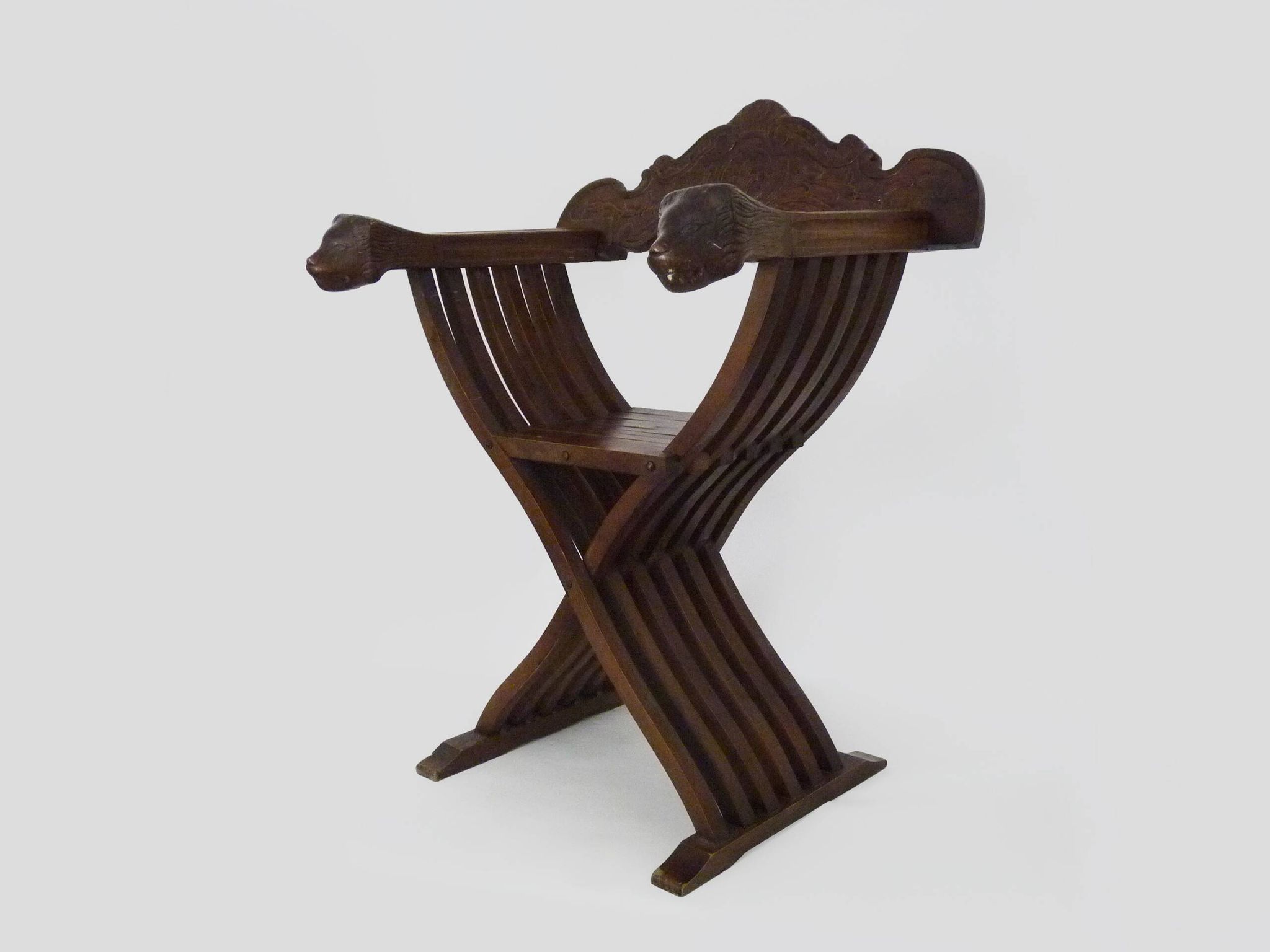 Vintage Savonarola chair with lion head, wood, Italy, 1950s