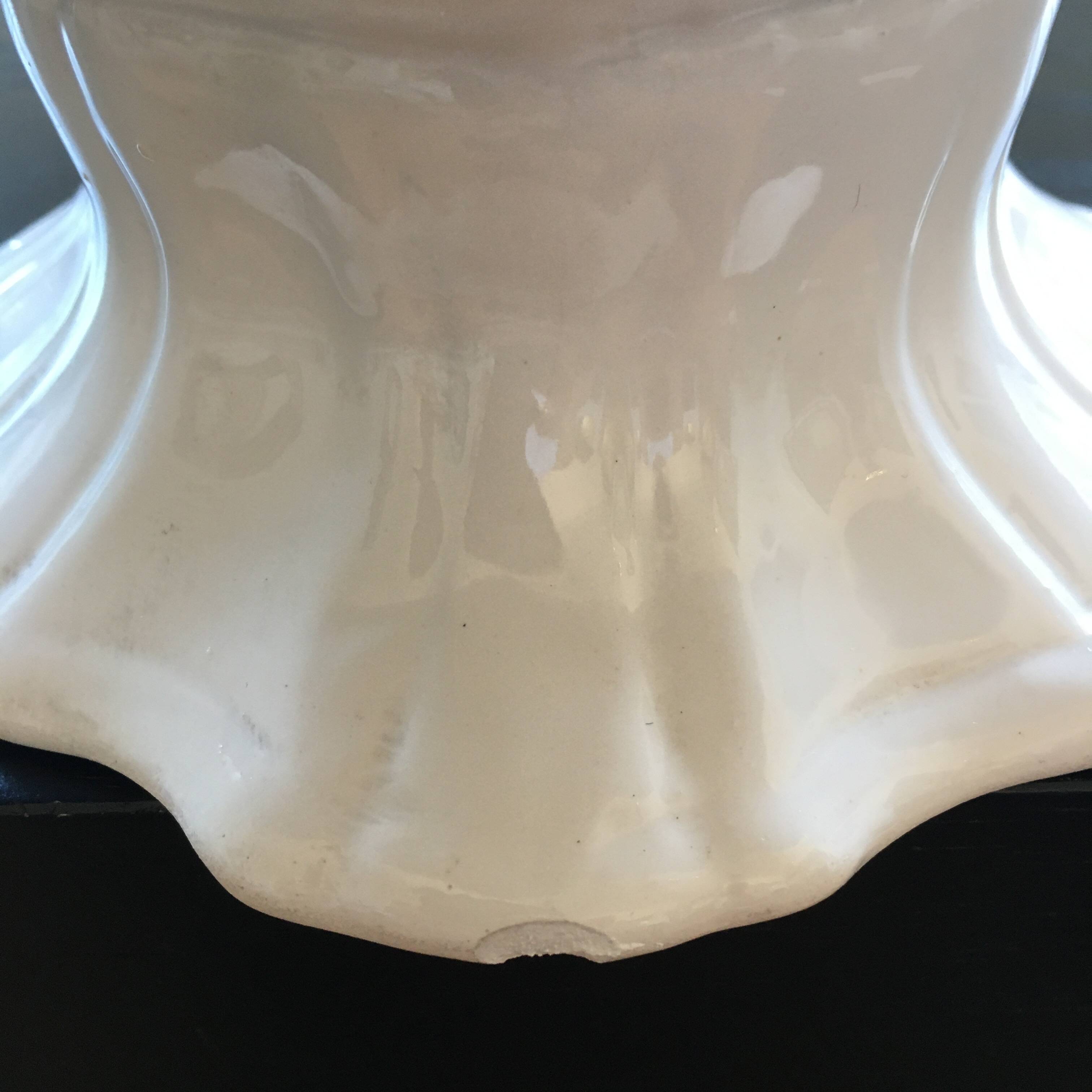 Large white scalloped cup