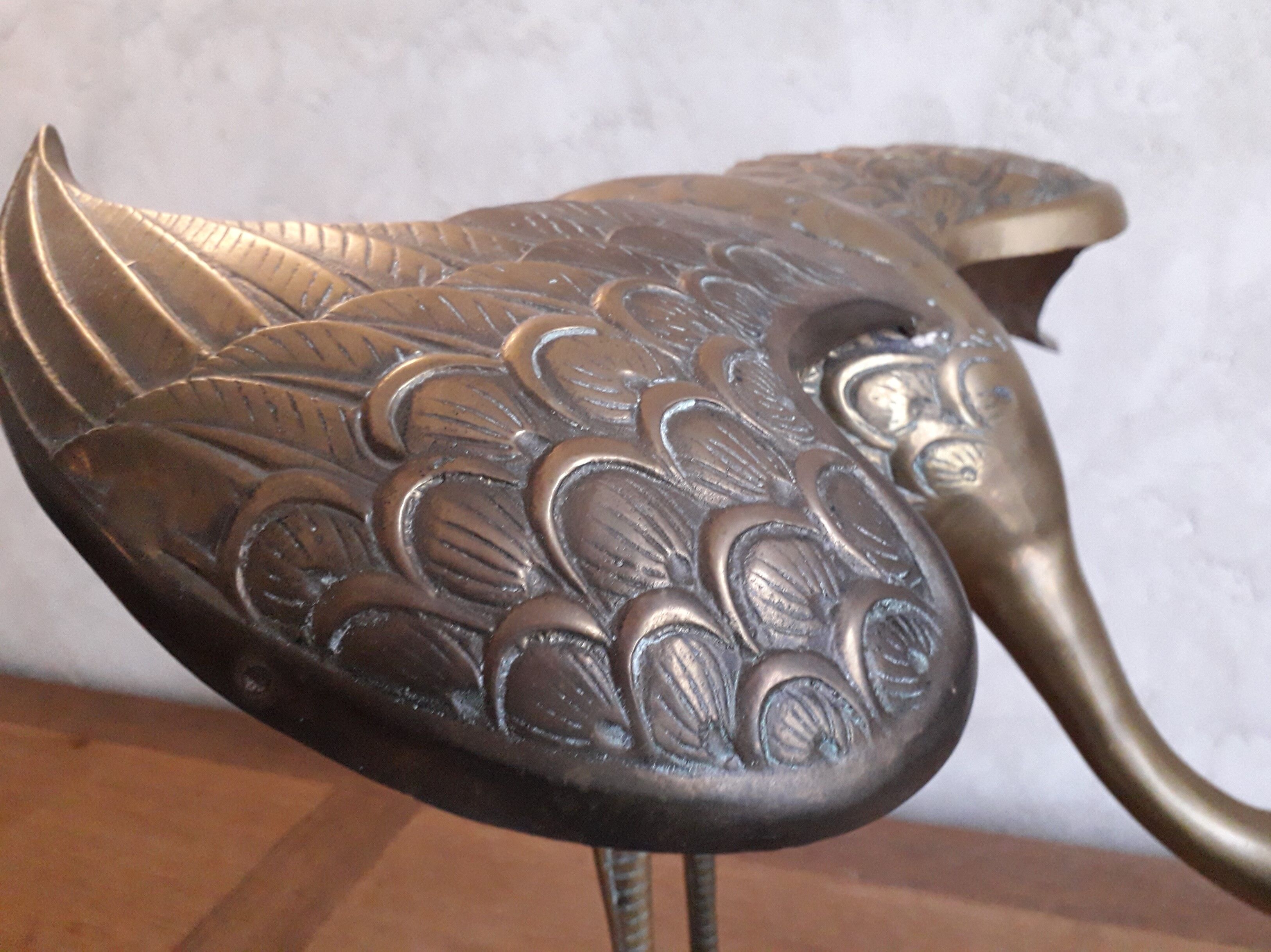 Brass heron