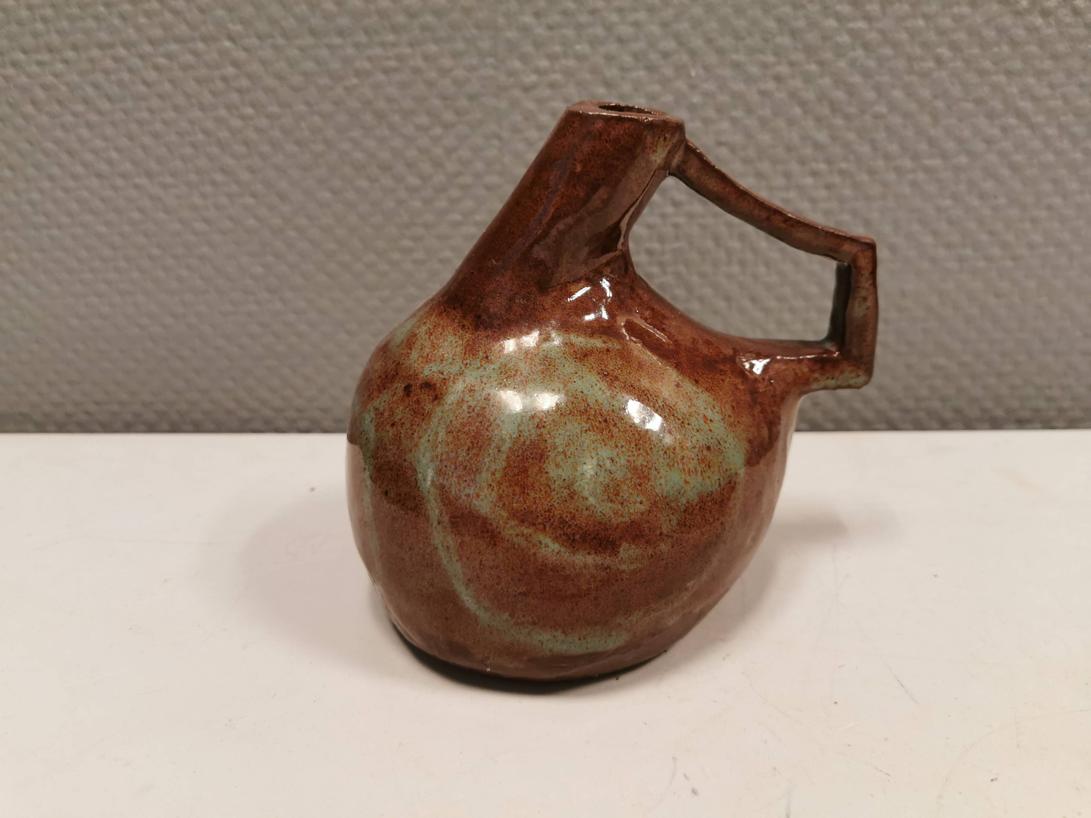Ceramic jug/vase, Danish in beautiful earthy brown colours with light blue/green details.