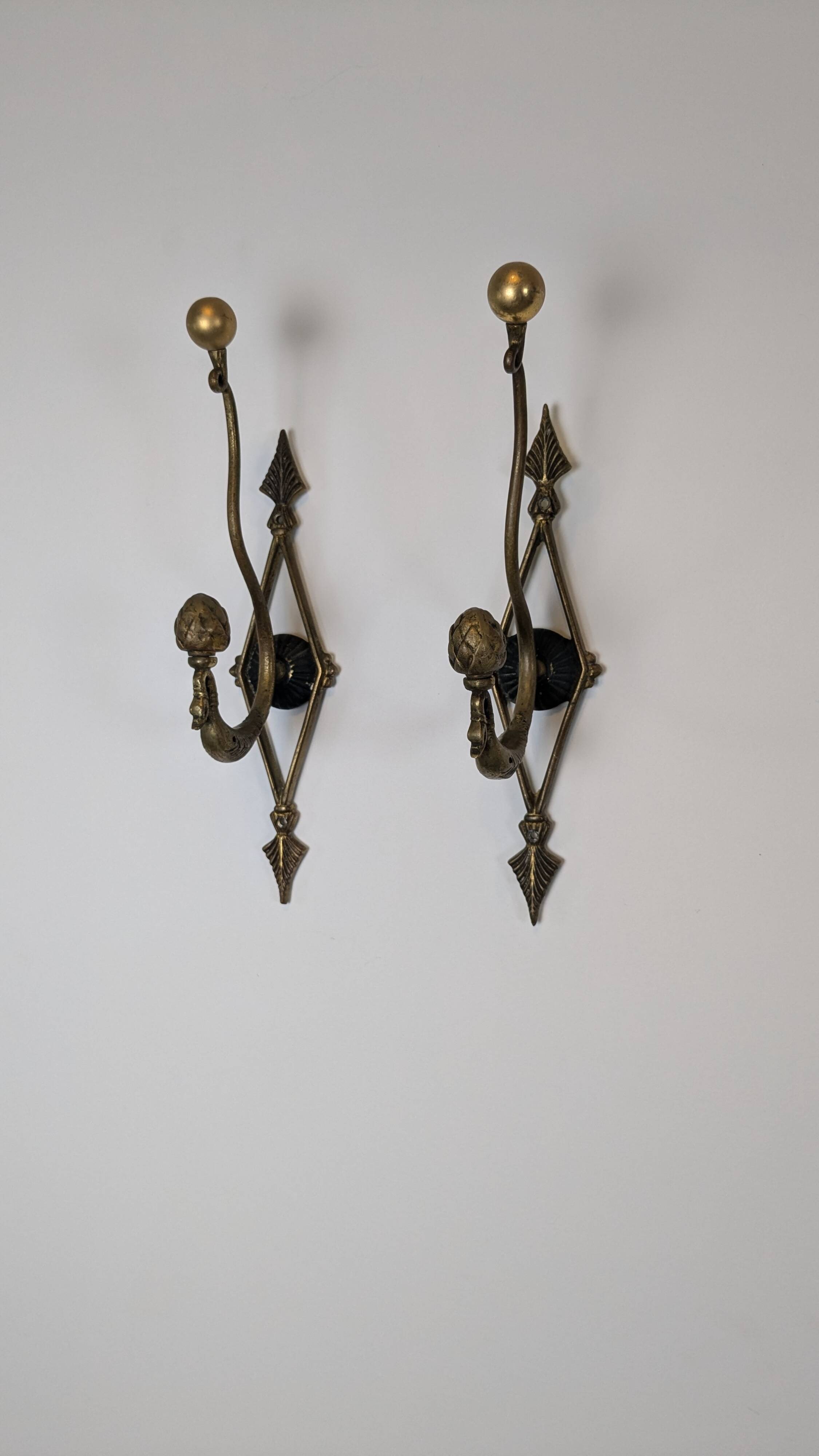 Antique pair of brass coat hooks
