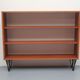 1960s book shelf in walnut, white back panel