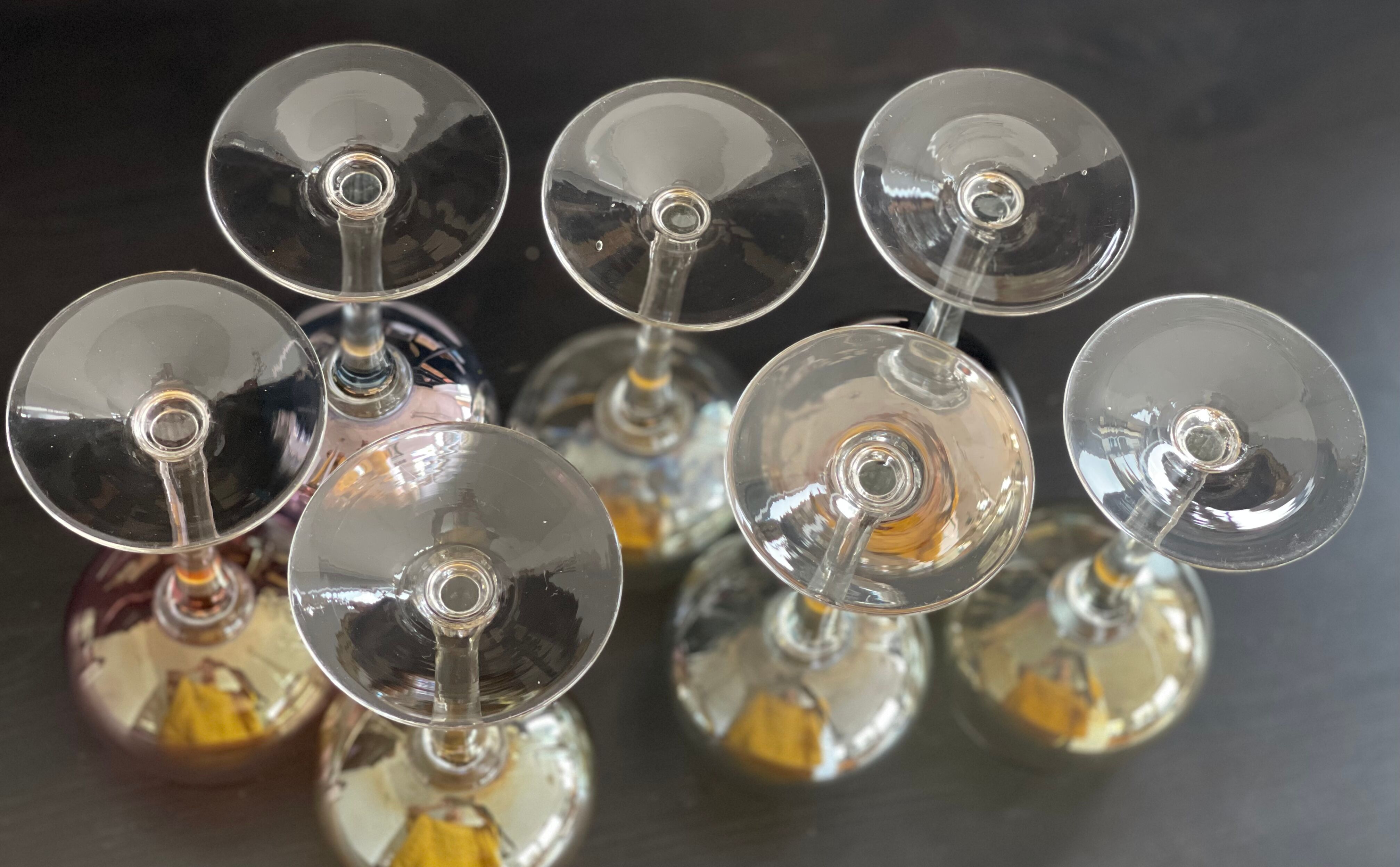 7 vintage iridescent foot glasses