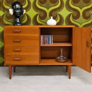 Small vintage sideboard from the 1960s with 4 drawers and a door.