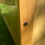 Vintage wooden and rattan baby cot from the 1960s.