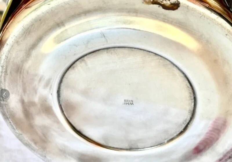Silver-plated ice bucket with a refined design, designed by Kurt Mayer for