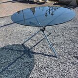 Round chrome metal table with smoked glass top from the 70s