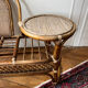 Rattan bench with round shelf